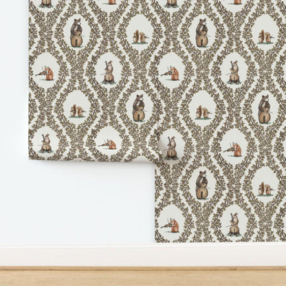 Patterned wallpaper with bear and woodland animals design on a white background